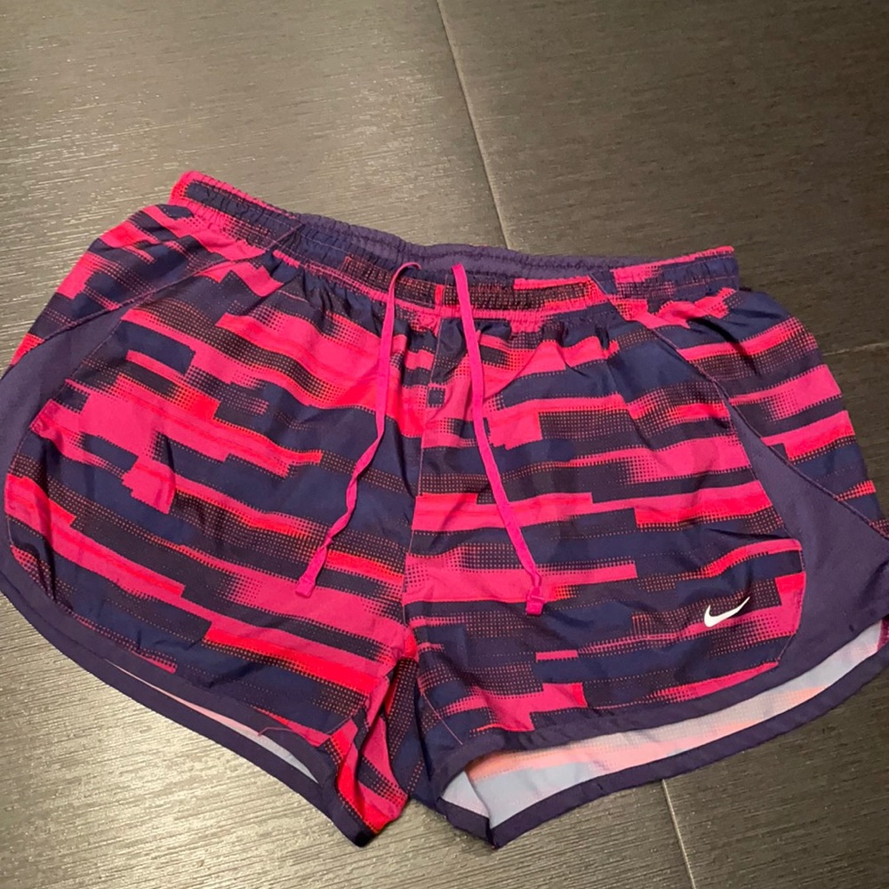 pink printed nike athletic shorts